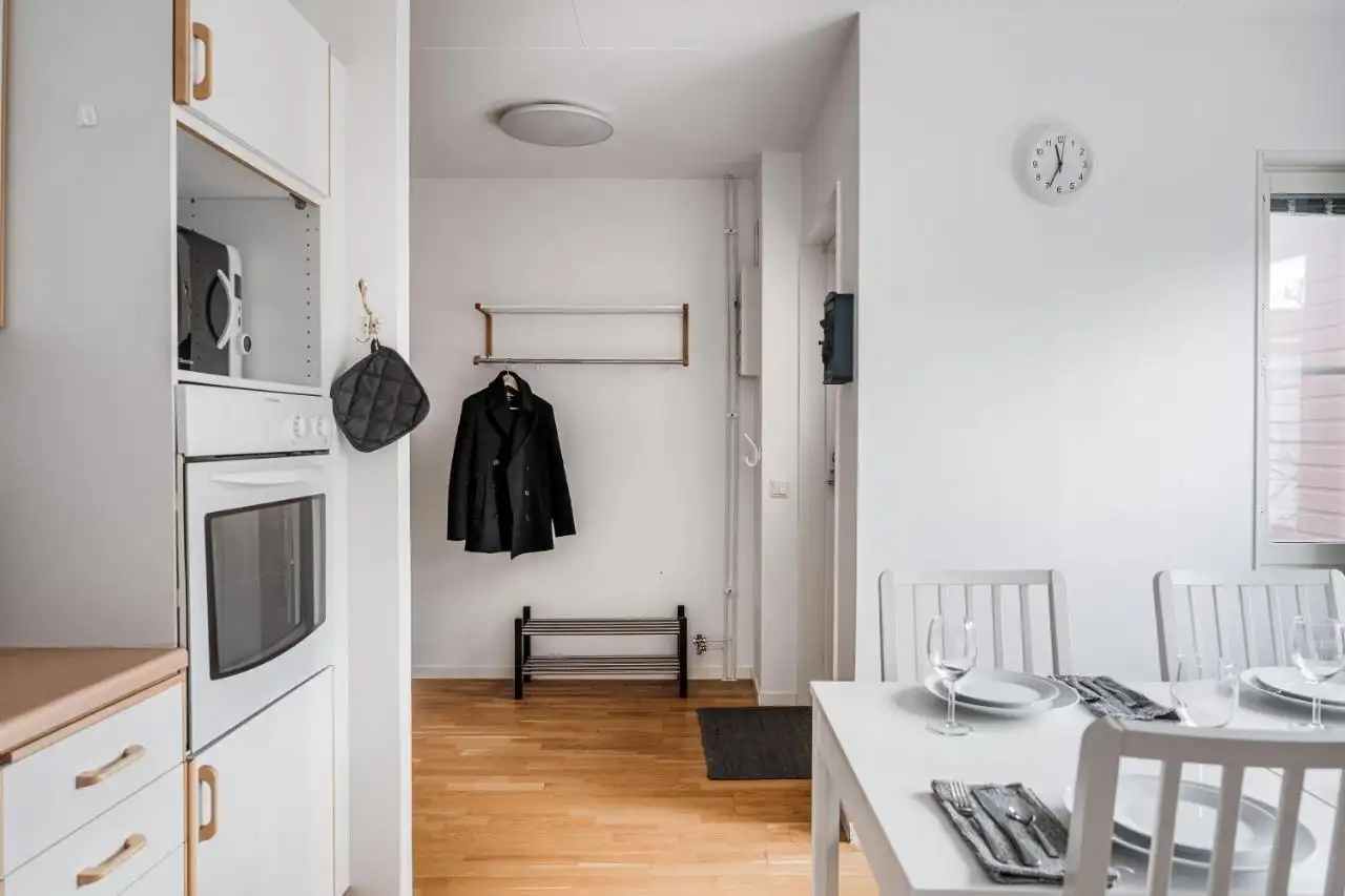 Entrance hall looking into kitchen of Uppsala short term rental
