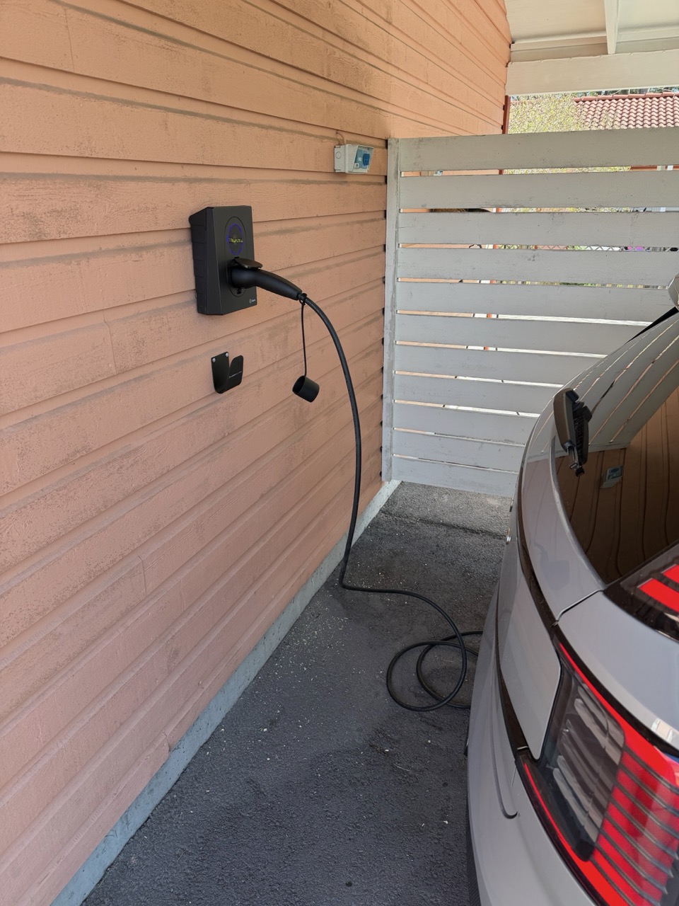 Zaptec Go 2 plugged into a Volvo EX30 charging port