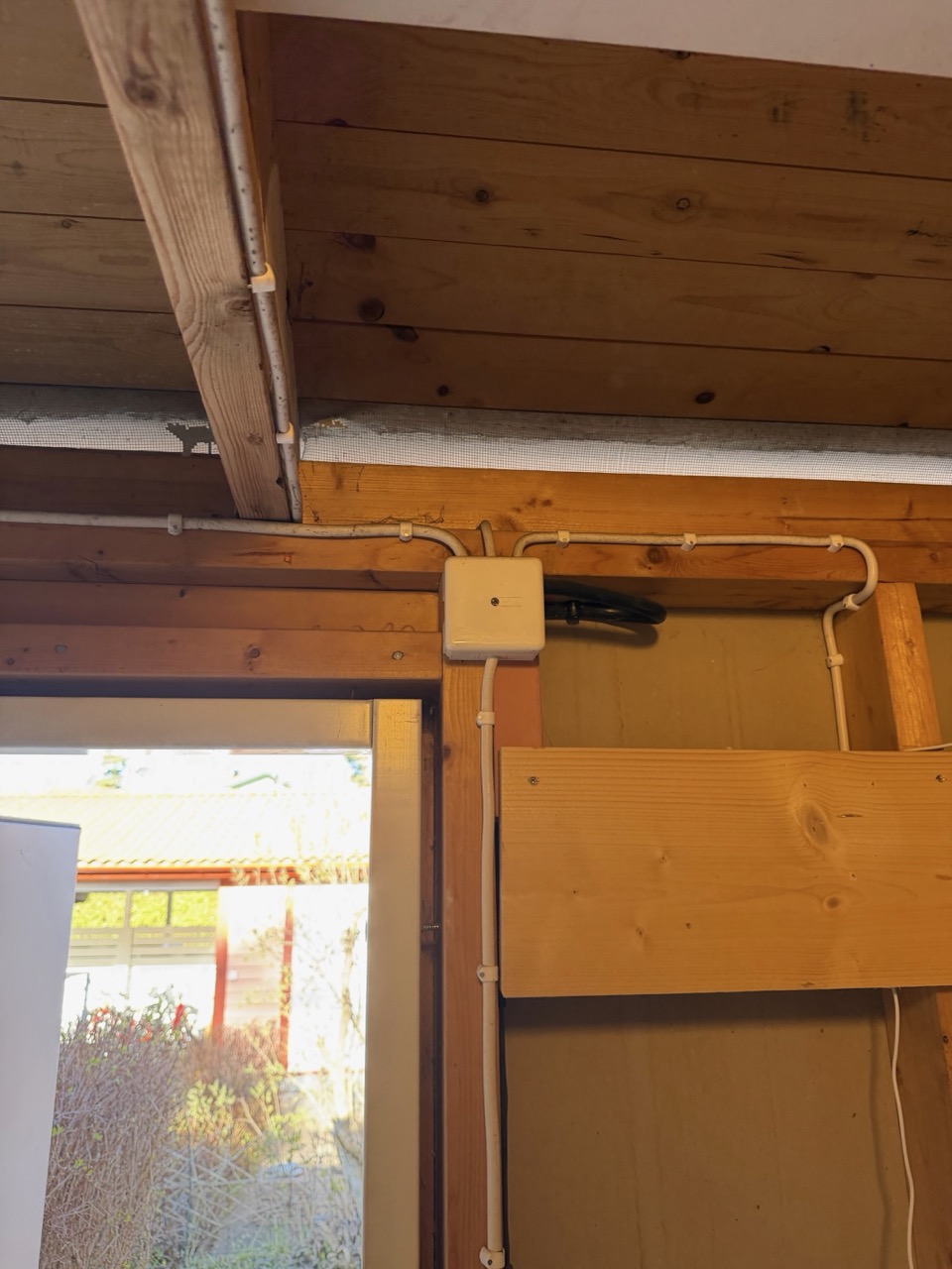Storage room ceiling with existing junction box and old cable routing