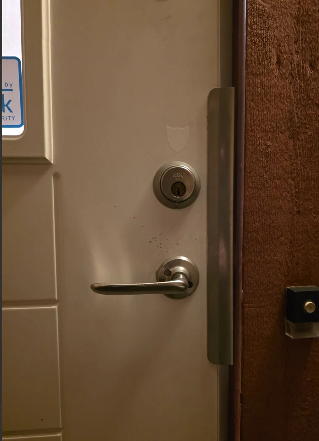 Edge of door showing the Assa 2000 lock case stamp